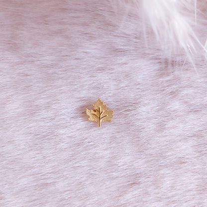 Tiny Maple Leaf Piercing